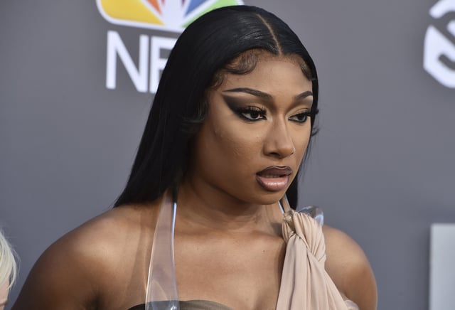 Megan Thee Stallion arrives at the Billboard Music Awards at the MGM Grand Garden Arena, May 15, 2022, in Las Vegas. A photographer who worked for the hip-hop star said in a lawsuit filed Tuesday, April 23, 2024, that he was forced to watch her have sex, was unfairly fired soon after and was abused as her employee. (Photo by Jordan Strauss/Invision/AP, File)