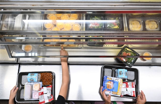 PEMBROKE, NC - SEPTEMBER 07: Students decide between Lunchables and a walking taco during lunch at Pembroke Elementary School on Thursday September 07, 2023 in Pembroke, NC. The school has been serving Lunchables as a lunch choice for students this school year. (Photo by Matt McClain/The Washington Post via Getty Images)