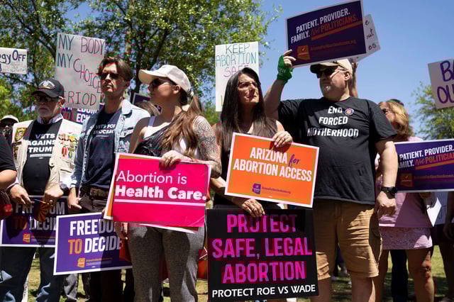 Members of Arizona for Abortion Access, the ballot initiative to enshrine abortion rights in the Arizona State Constitution, hold a press conference and protest condemning Arizona House Republicans and the 1864 abortion ban during a recess from a legislative session at the Arizona House of Representatives on April 17, 2024, in Phoenix, Arizona.