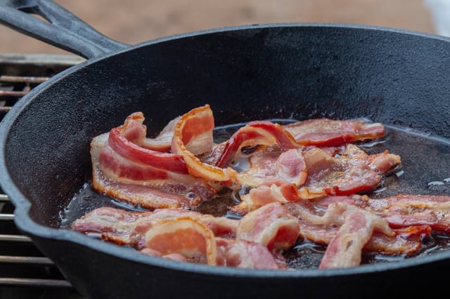 Cooking bacon in a skillet is perhaps the most traditional and most delicious way to prepare your breakfast side dish. (Photo by Michelle @Shelly Captures It on Unsplash)