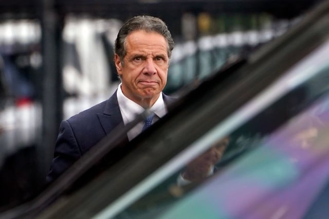 New York Gov. Andrew Cuomo prepares to board a helicopter after announcing his resignation, on Aug. 10, 2021, in New York.