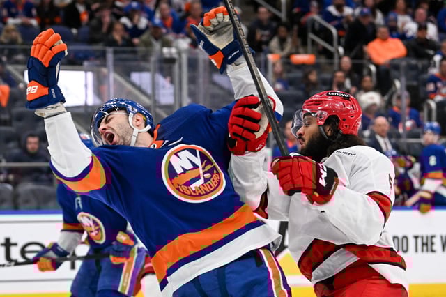 New York Islanders defenseman Adam Pelech (3) reacts after being hit by Carolina Hurricanes defenseman Jalen Chatfield during Game 3.