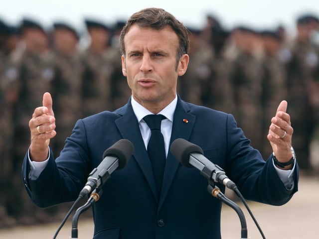 Emmanuel Macron, France's president, speaks at a news conference during a visit to NATO forces at the Mihail Kogalniceanu Military Base in Constanta, Romania, on Wednesday, June 15, 2022. Macron said hell back Romanias fresh bid to unlock the nations efforts to join the European Unions visa-free travel bloc, which have been stalled for years. Photographer: Andrei Pungovschi/Bloomberg via Getty Images