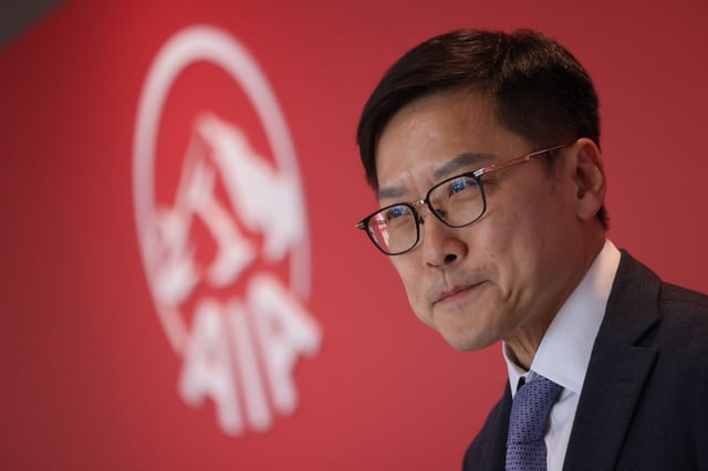 Lee Yuan Siong, AIA’s group CEO and president, appears at a press conference at AIA Central on March 14, 2024. Photo: Jonathan Wong