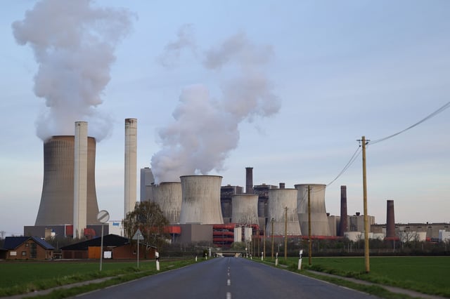 Water vapour rises from cooling towers of the Niederaussem coal-fired power plant on March 25, in Bergheim, Germany.