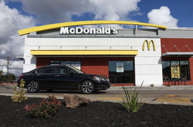A sign is posted in front of a McDonald's restaurant on February 6, 2024, in San Leandro, Calif.