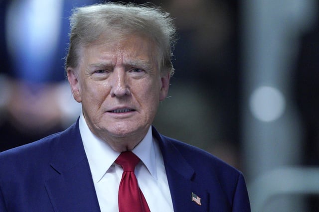 Former President Donald Trump speaks to the media outside the courtroom during his trial for allegedly covering up hush money payments at Manhattan Criminal Court on April 30, 2024 in New York City.