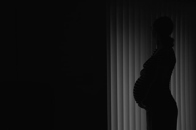 Silhouette of the pregnant woman black and white