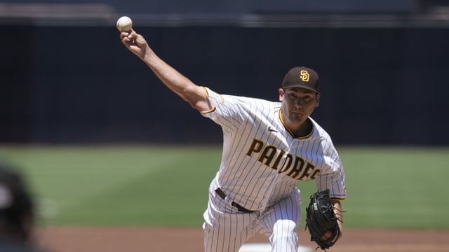 San Diego Padres starting pitcher Seth Lugo works against a Los Angeles Dodgers batter during the first inning of a baseball game Monday, Aug. 7, 2023, in San Diego. (AP Photo/Gregory Bull)