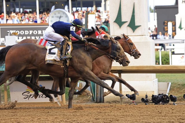 Mystik Dan, ridden by jockey Brian J. Hernandez Jr., crosses the finish line to win the 150th Kentucky Derby at Churchill Downs on May 4.
