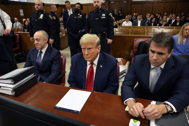 Donald Trump sits in a Manhattan Criminal Courtroom with members of his legal team for the continuation of his hush money trial on April 25, 2024 in New York City. Former U.S. President Donald Trump faces 34 felony counts of falsifying business records in the first of his criminal cases to go to trial.