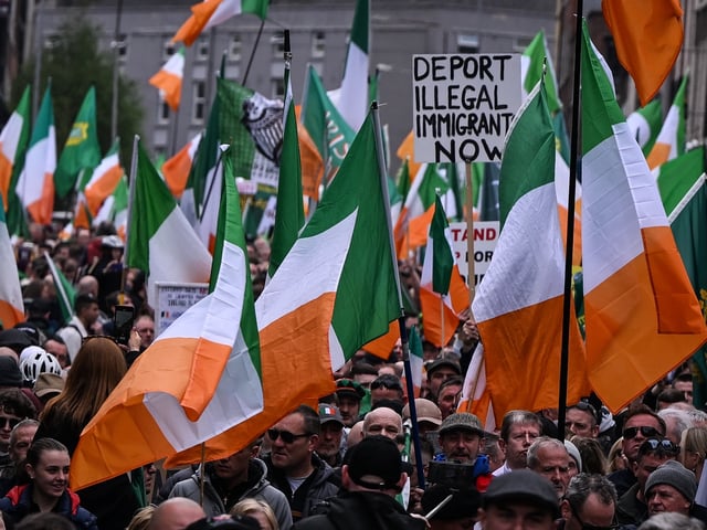 DUBLIN, IRELAND - MAY 6: Thousands of Irish protesters gathered in Dublin city center for an Anti-Mass Immigration protest, starting at the Gardens of Remembrance and proceeding through O'Connell Street, on May 6, 2024, in Dublin, Ireland. Since November 2022, Ireland has seen protests over temporary asylum seeker shelters due to a refugee surge, hitting 81,256, up 748.98% from 2021. With immigration surging in 2023 and currently, Irish citizens express growing outrage and frustration. (Photo by Artur Widak/NurPhoto via Getty Images)