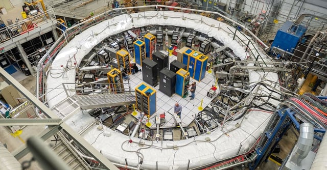 The Muon g-2 ring sits in its detector hall at U.S. Department of Energy's Fermi National Accelerator Laboratory (Fermilab) in Batavia, Illinois, U.S., in an undated handout photo. An experiment studied the wobble of subatomic particles called muons as they traveled through a magnetic field. Fermi National Accelerator Laboratory/Ryan Postel/Handout via REUTERS