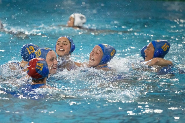 UCLA players celebrate their 7-4 victory over California in an NCAA women’s water polo championship on Sunday, May 12, 2024 in Berkeley, Calif.
