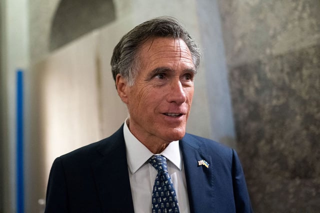 U.S. Senator Mitt Romney (R-UT) speaks with members of the media ahead of a Senate vote to begin work on a bill that includes aid for Ukraine, Israel and Taiwan in Washington, U.S., February 9, 2024. REUTERS/Nathan Howard”