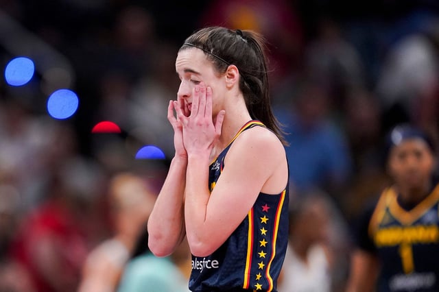May 16, 2024; Indianapolis, IN, USA; Indiana Fever guard Caitlin Clark (22) shows frustration, Thursday, May 16, 2024, during the Indiana Fever home opener game against the New York Liberty at Gainbridge Fieldhouse in Indianapolis. Mandatory Credit: Grace Hollars-USA TODAY Sports