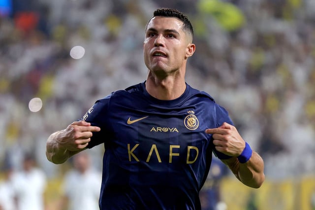 TOPSHOT - Nassr's Portuguese forward #07 Cristiano Ronaldo celebrates his second goal during the Saudi Pro League football match between Al-Nassr and Al-Shabab in Riyadh's Al-Awal Park Stadium on August 29, 2023. (Photo by Fayez Nureldine / AFP) (Photo by FAYEZ NURELDINE/AFP via Getty Images)