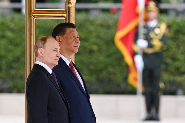 Xi Welcomes Putin to Beijing