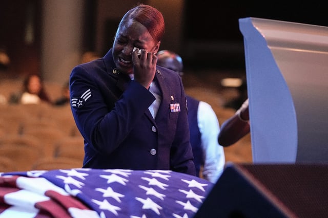 U.S. Air Force personnel stand near the coffin of slain airman Roger Fortson during his funeral near Atlanta on May 17, 2024.