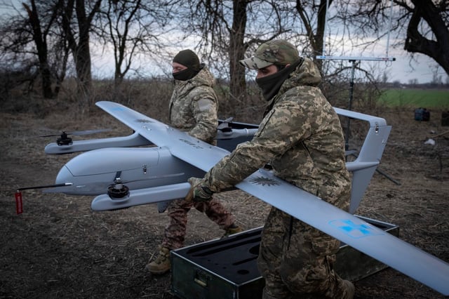 Ukrainian soldiers prepare to launch the Poseidon H10 Middle-range drone near the city of Bakhmut. Photo: AP