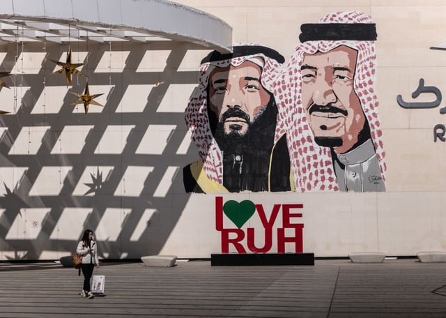 A wall mural displaying Saudi Arabia’s Crown Prince Mohammed bin Salman, left, and Saudi Arabia’s King Salman bin Abdulaziz, outside Riyadh Park shopping mall on Jan. 19, 2023.