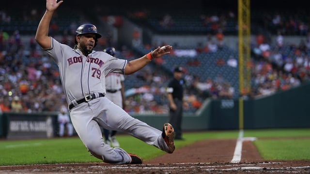 Houston Astros' Jose Abreu scores on a single by Jose Altuve in the second inning of a baseball game against the Baltimore Orioles, Wednesday, Aug. 9, 2023, in Baltimore. (AP Photo/Julio Cortez)