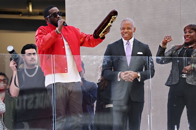 New York Mayor Eric Adams presents Sean "Diddy" Combs with the keys to the city in Times Square in New York City on Sept. 15, 2023.