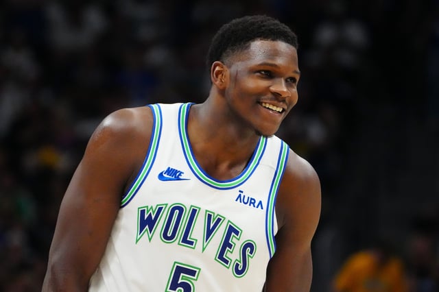 Minnesota Timberwolves guard Anthony Edwards (5) reacts in the second quarter against the Denver Nuggets in game seven of the second round for the 2024 NBA playoffs at Ball Arena.