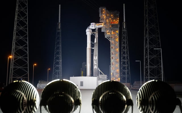A United Launch Alliance Atlas V rocket with Boeing’s Starliner spacecraft aboard is seen on the launch pad illuminated by spotlights at Space Launch Complex 41 on Sunday, May 5, 2024. Credit: NASA/Joel Kowsky