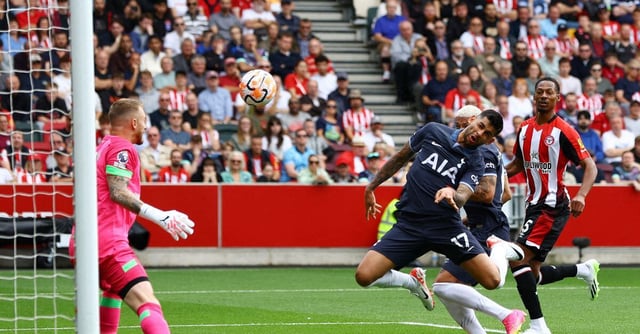 Soccer Football - Premier League - Brentford v Tottenham Hotspur - Brentford Community Stadium, London, Britain - August 13, 2023 Tottenham Hotspur's Cristian Romero scores their first goal Action Images via Reuters/Paul Childs 
