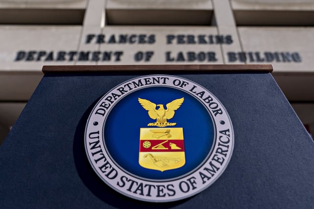 The U.S. Department of Labor seal hangs on a podium outside the headquarters in Washington, D.C., U.S., on Thursday, Aug. 29, 2019.