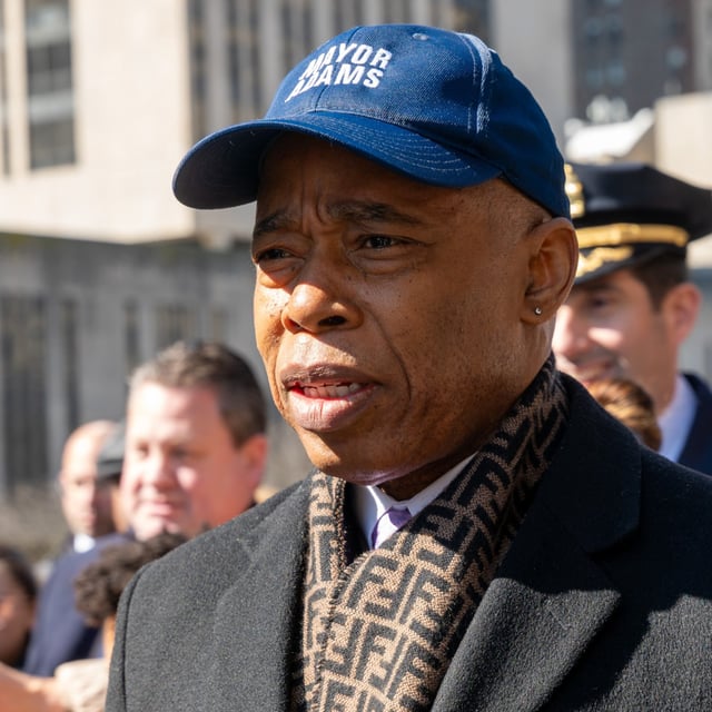 New York City Mayor Eric Adams attends a memorial for the 30th anniversary of the killing of teenager Ari Halberstam on the Brooklyn Bridge on March 01, 2024 in New York City. Adams and city officials are beginning to evict migrants from shelters due to space and funding concerns.
