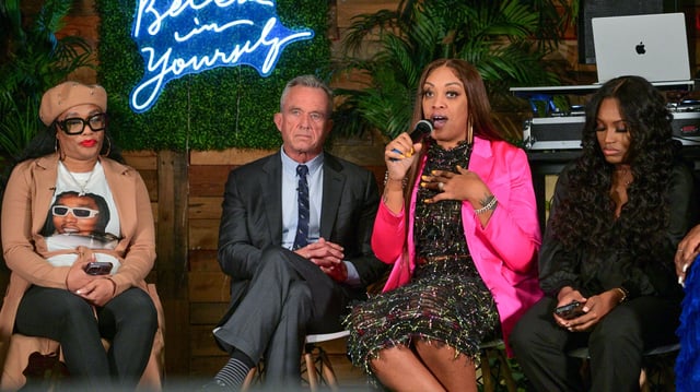 Robert F. Kennedy Jr. and Angela Stanton King, center, speak onstage during A Conversation For Black Women With Independent Presidential Candidate Robert F. Kennedy Jr. at YG Urban Cafe on January 13 in Atlanta.