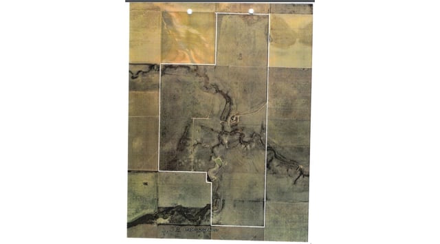 This is a photo of pasture land in the Oklahoma Panhandle where the bodies of two Kansas women were found buried April 14. The photo was included in search warrant records filed with the Texas County Court Clerk.
