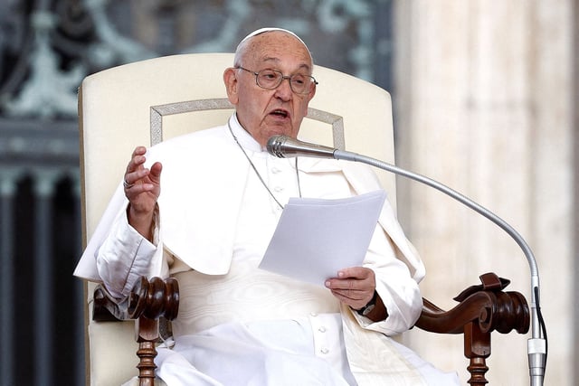 Pope Francis attends the weekly general audience in St. Peter Square at the Vatican on Wednesday.