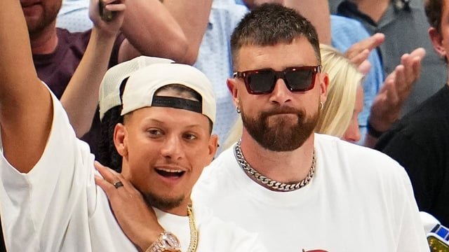 Patrick Mahomes and Travis Kelce of the Kansas City Chiefs react during the fourth quarter of Game Three of the Western Conference Finals between the Dallas Mavericks and the Minnesota Timberwolves at American Airlines Center on May 26, 2024 in Dallas, Texas. 