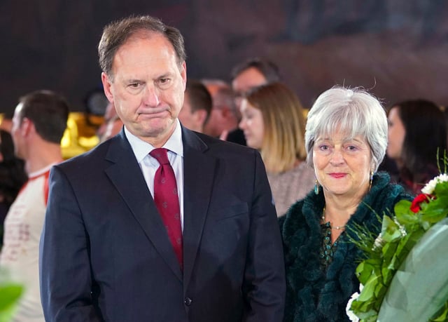 US Supreme Court Justice Samuel Alito and his wife, Martha-Ann Alito, pay their respects at the casket of Reverend Billy Graham at the Rotunda of the US Capitol Building in February 2018. Photo: AP