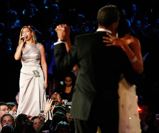 President Barack Obama dances with his wife and First Lady Michelle Obama as Beyonce sings "At Last" during the first Inaugural Ball on January 20, 2009 in Washington, DC.
