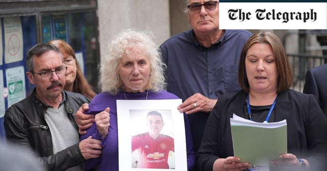 Yvonne Valentine is supported by family members and holds a photograph of her murdered son as Dc Kim McHugh reads her statement outside the Old Bailey