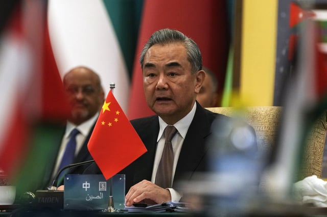 Chinese Foreign Minister Wang Yi speaks as chair of the 10th ministerial meeting of the China-Arab States Cooperation Forum on May 30, 2024 in Beijing, China.