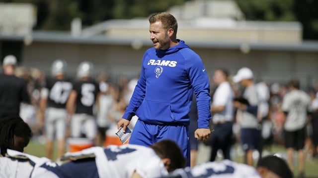 Rams head coach Sean McVay watches players stretch during a joint practice with the Raiders in 2019.