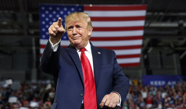 President Donald Trump gestures to the crowd as he arrives to speak at a campaign rally at Williams Arena in Greenville, N.C., Wednesday, July 17, 2019. (AP Photo/Carolyn Kaster)