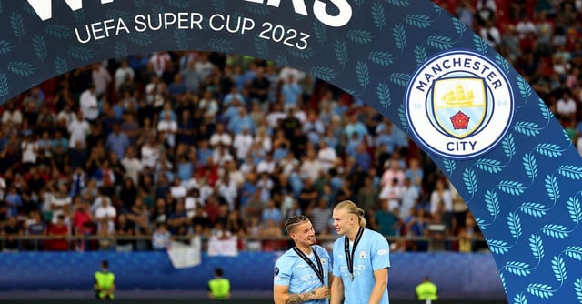 Soccer Football - UEFA Super Cup - Manchester City v Sevilla - Georgios Karaiskakis Stadium, Athens, Greece - August 16, 2023 Manchester City's Kalvin Phillips and  Erling Braut Haaland celebrate with their medals after winning the UEFA Super Cup REUTERS/Stoyan Nenov