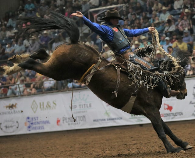 Spencer Wright competes in saddle bronc riding during the San Angelo Stock Show & Rodeo finals at Foster Communications Coliseum on Friday, April 15, 2022. The boy's 3-year-old son, Levi, died on June 2, 2024 after being taken off life support following an accident.