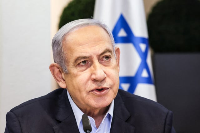 Israeli Prime Minister Benjamin Netanyahu heads the weekly cabinet meeting at the Defense Ministry in Tel Aviv on Jan. 7, 2024.