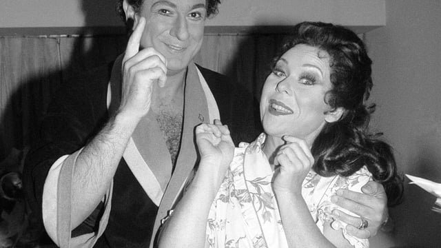 FILE - Tenor Placido Domingo, left, appears with soprano Renata Scotto in a backstage dressing room prior their opening night performance of Vincenzo Bellini's "Norma" at the Metropolitan Opera House in New York on Sept. 22, 1981. Scotto, a soprano of uncommon intensity who became a successful director after her singing career, died Wednesday in her hometown of Savona, Italy. She was 89. (AP Photo/Elizabeth Richter, File)
