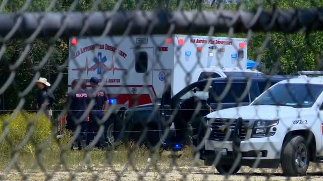 In a still picture taken from a video, EMS and fire personnel are seen on the scene on June 6.