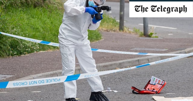 Police and forensics investigate the scene where two men were attacked near Rawnsley Park