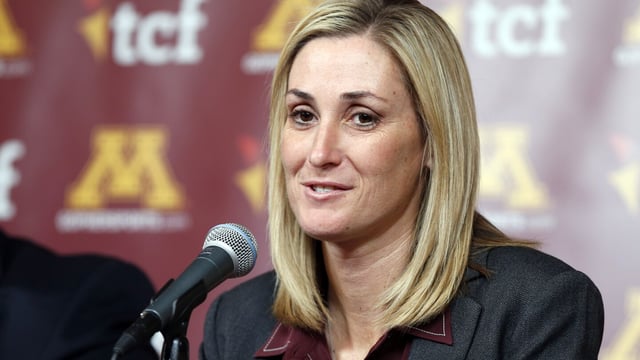 FILE - University of Minnesota interim athletic director Beth Goetz takes a question during an NCAA college football news conference in Minneapolis on Nov. 11, 2015. Goetz takes over as athletic director at Iowa for Gary Barta, who retired July 31, 2023, after 17 years. She was hired last September as deputy athletic director and chief operating officer after four years as Ball State's athletic director, and as an athletic administrator at Connecticut and Minnesota before that. (AP Photo/Jim Mone, File)