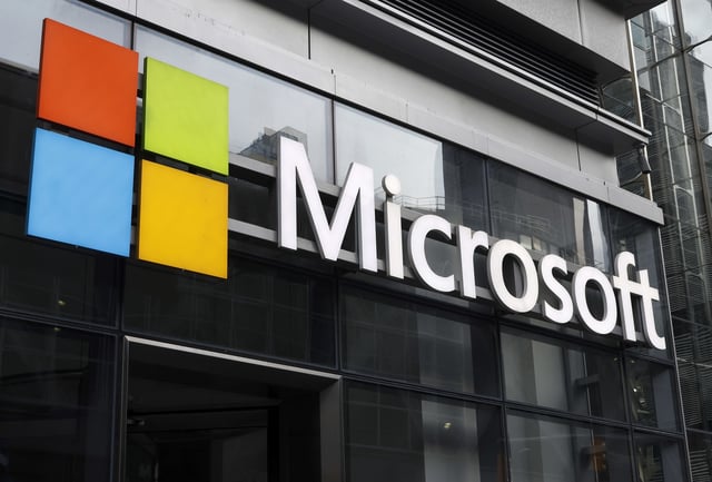 NEW YORK, NY - DECEMBER 30: The corporate logo for Microsoft is displayed on the front of their building on 8th Avenue on December 30, 2023, in New York City. (Photo by Gary Hershorn/Getty Images)